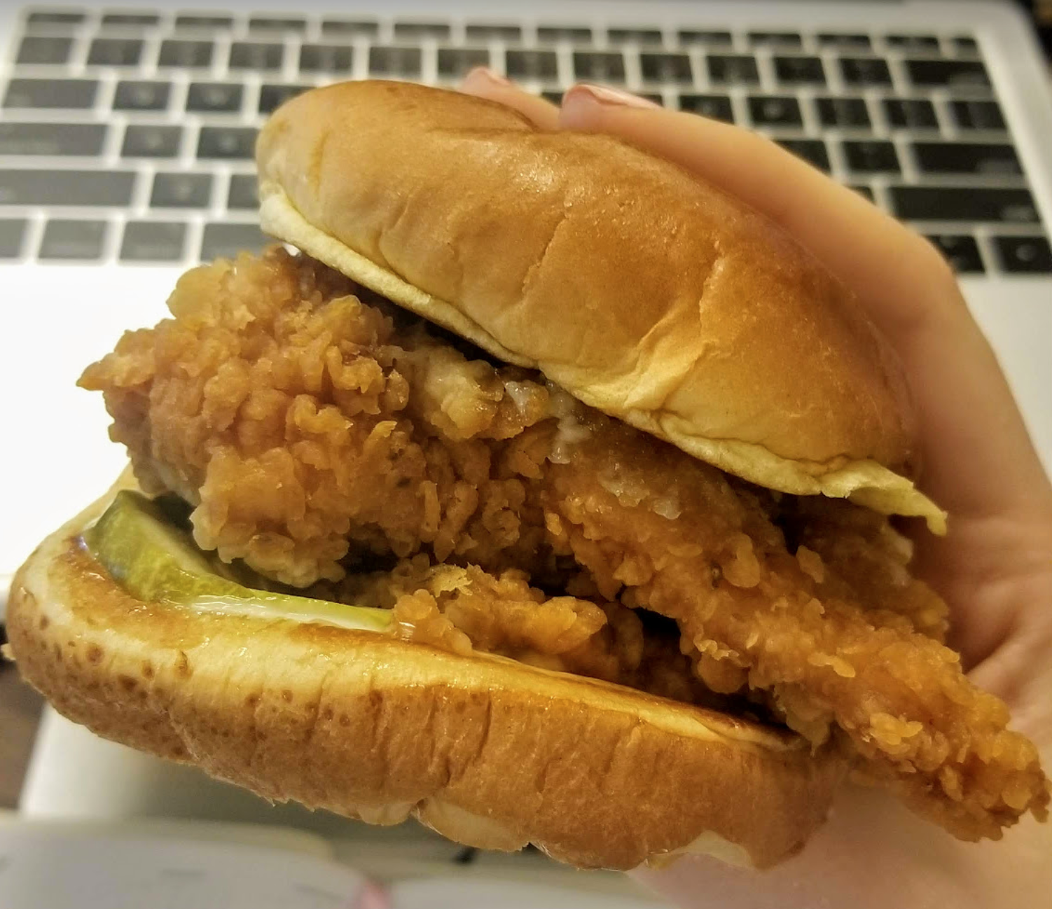 closeup of Popeyes chicken sandwich